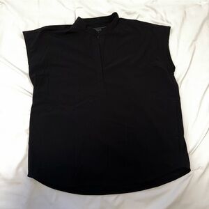 Figs scrub top in black.